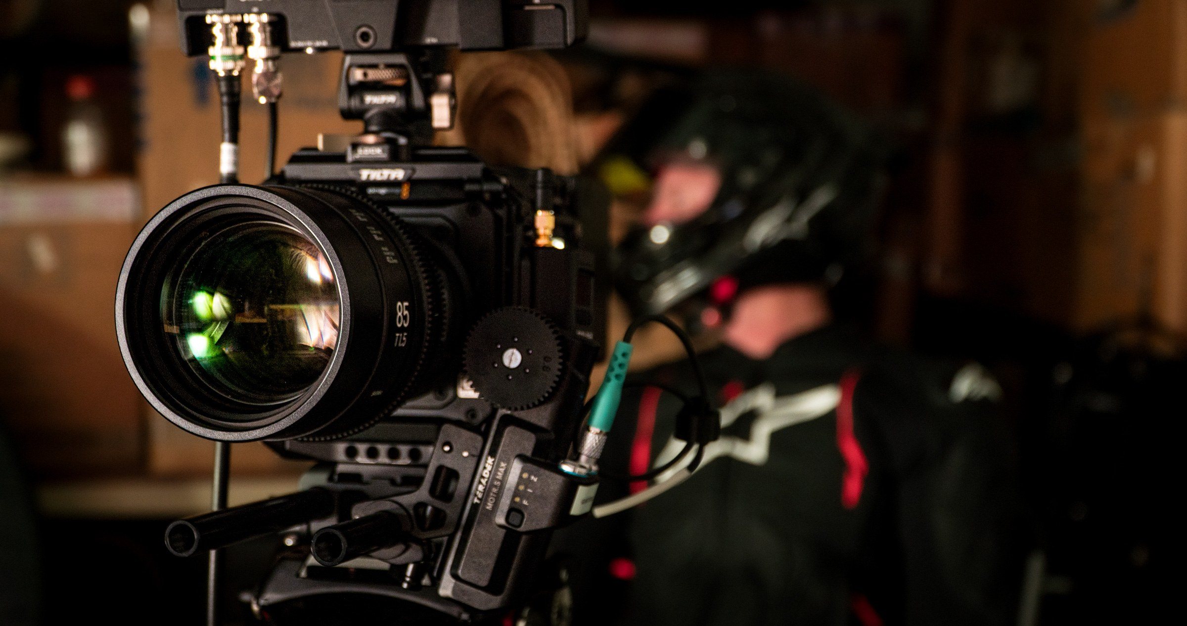 Cinema camera rig framing a rider in Alpinestars gear